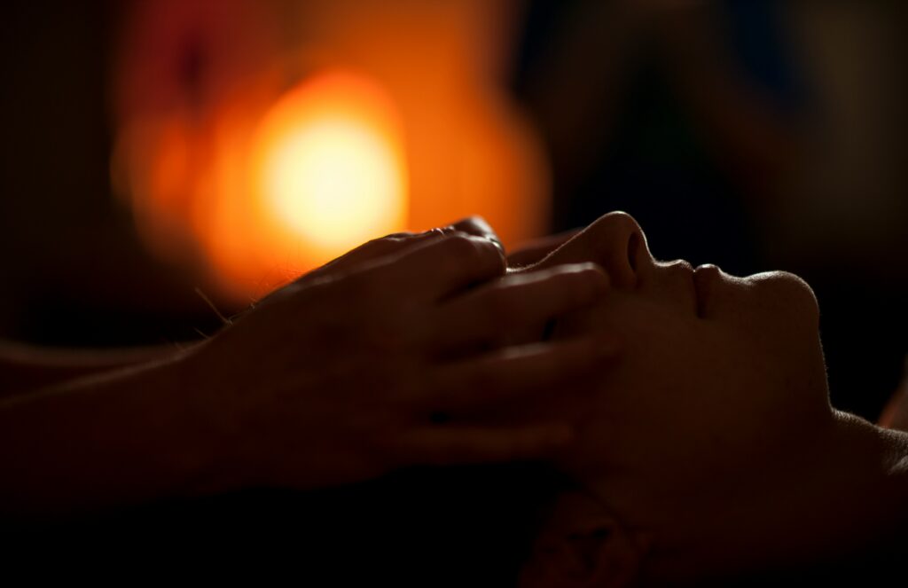 Cranial head massage by candlelight for deep relaxation at Li's Spa Redmond