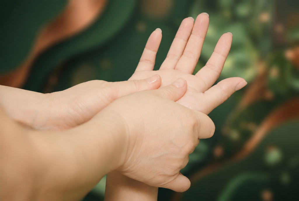 Hand and palm massage for tension release at Li's Spa Redmond
