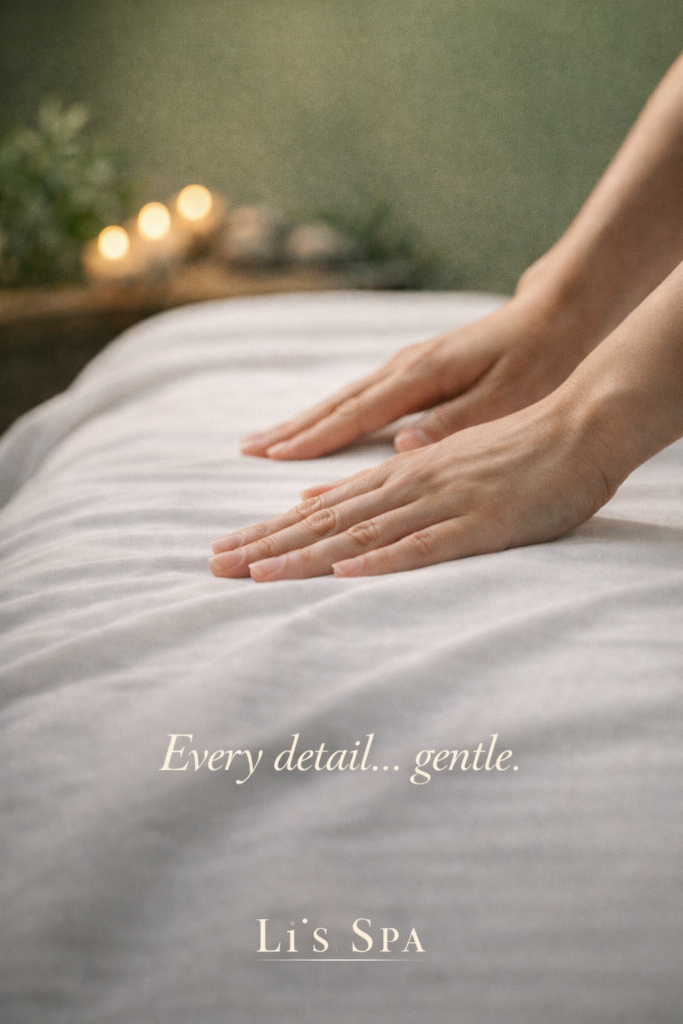 Pristine massage table preparation in a clean treatment room at Li's Spa Redmond