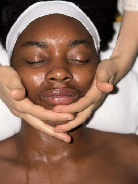 Professional facial massage for sculpting and lymphatic drainage at Li's Spa in Redmond, WA