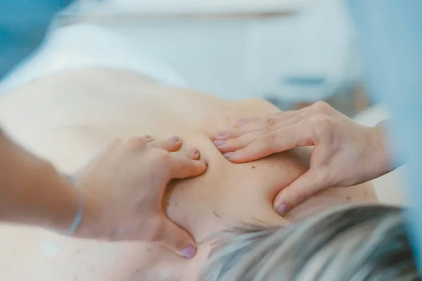 Neck and shoulder deep tissue massage for desk workers at Li's Spa Redmond
